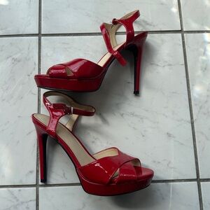 GUESS red high heels